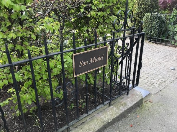 Bronze nameplate on railings